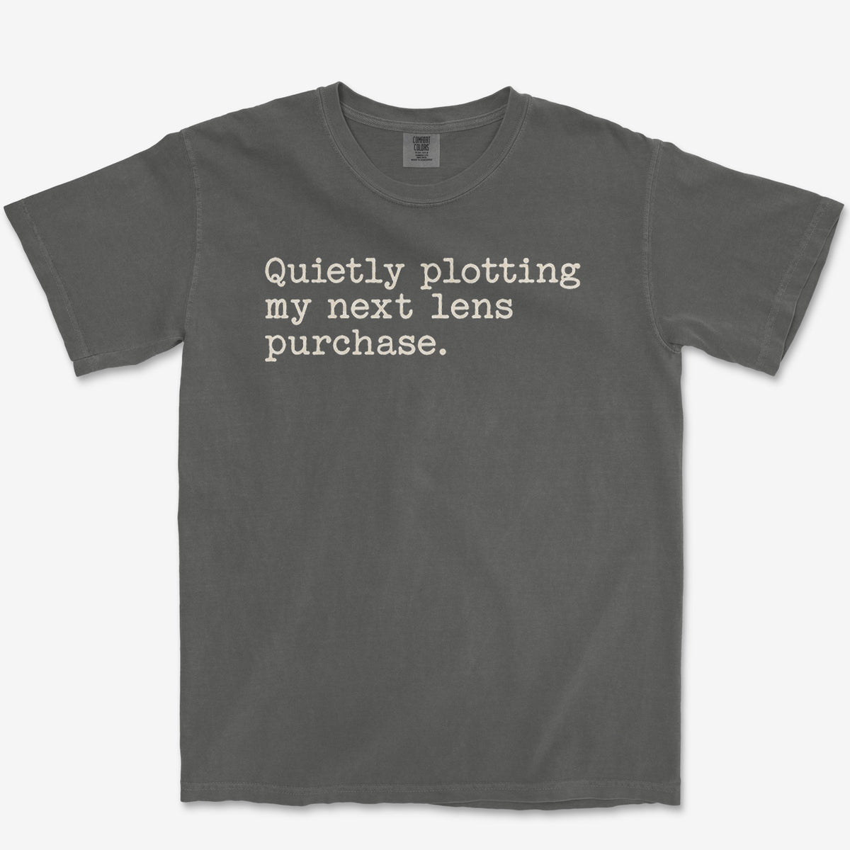 Quietly Plotting Lens Tee — pepper